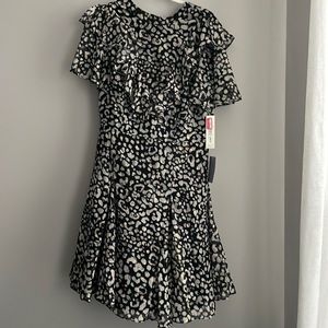 Black and white Elisa j dress with gold detailing